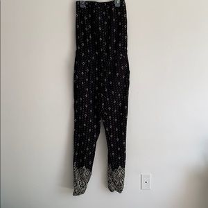 Black patterned jumpsuit.